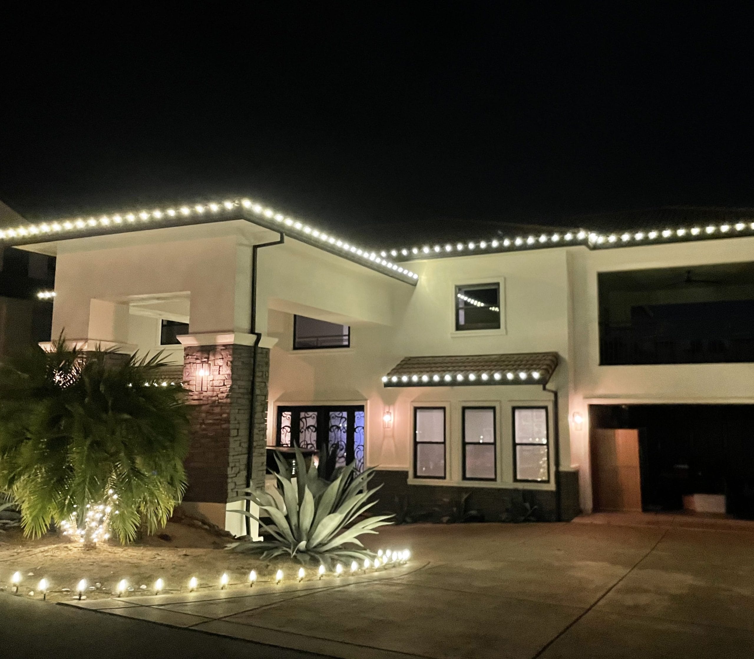 Fair-Oaks-Christmas-lights-hanging this image shows Christmas lights hanging in Fair Oaks, CA